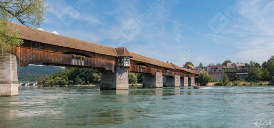 The historic wood bridge to Switzerland over Rhine river in Bad Saeckingen at summer, Black Forest, Baden-Wurttemberg, Germany, Europe  : Stock Photo or Stock Video Download rcfotostock photos, images and assets rcfotostock | RC Photo Stock.: