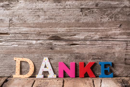 The word "DANKE" in colorful wooden letters placed on a rustic wooden surface, creating a simple and heartfelt expression of gratitude in a cozy and natural setting  : Stock Photo or Stock Video Download rcfotostock photos, images and assets rcfotostock | RC Photo Stock.: