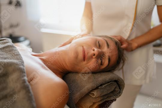 Therapist providing a neck massage to a relaxed female client in a spa hotel resort  : Stock Photo or Stock Video Download rcfotostock photos, images and assets rcfotostock | RC Photo Stock.: