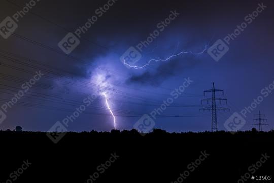 thunderbolt impact next to a Electricity pylon  : Stock Photo or Stock Video Download rcfotostock photos, images and assets rcfotostock | RC Photo Stock.: