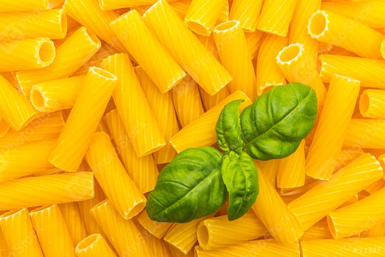 Tortiglioni Noodles background with basil leaf  : Stock Photo or Stock Video Download rcfotostock photos, images and assets rcfotostock | RC Photo Stock.: