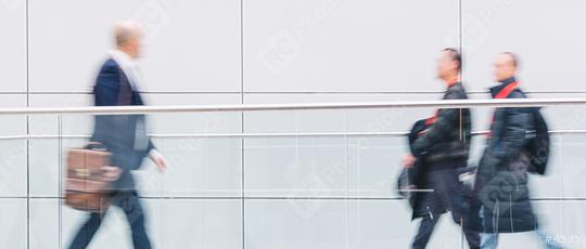 trade show visitors walking in a clean futuristic corridor  : Stock Photo or Stock Video Download rcfotostock photos, images and assets rcfotostock | RC Photo Stock.: