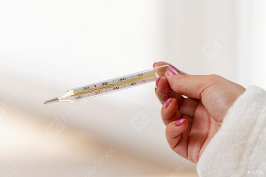 Traditional thermometer for measuring body temperature in hand  : Stock Photo or Stock Video Download rcfotostock photos, images and assets rcfotostock | RC Photo Stock.: