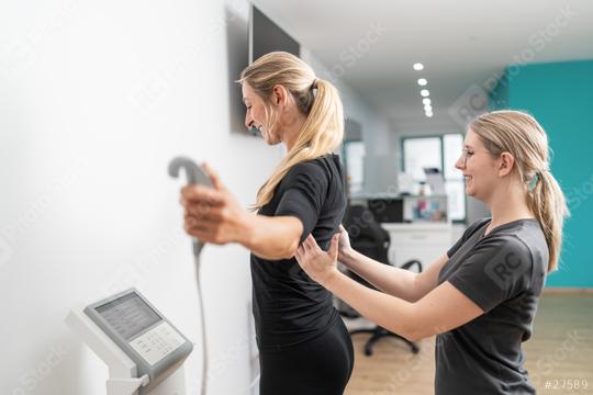 trainer assisting a client on a body composition medical scale for a Inbody test in a gym, both smiling.  : Stock Photo or Stock Video Download rcfotostock photos, images and assets rcfotostock | RC Photo Stock.: