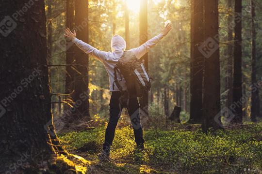 Traveler Man raised hands at sunset in the forest - Travel Lifestyle emotional concept  : Stock Photo or Stock Video Download rcfotostock photos, images and assets rcfotostock | RC Photo Stock.:
