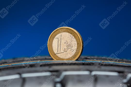 Tread depth measured at car tire with Euro coin  : Stock Photo or Stock Video Download rcfotostock photos, images and assets rcfotostock | RC Photo Stock.: