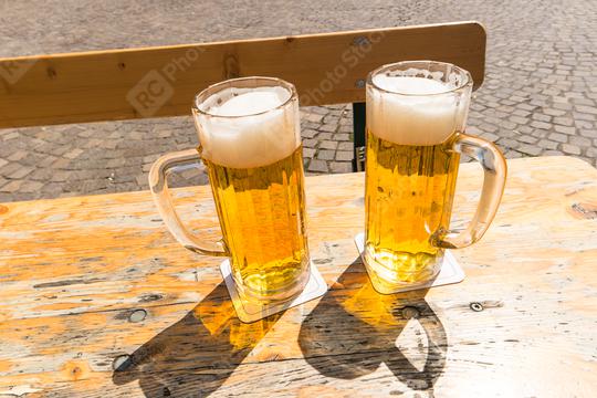 Two beers on table in the garden pub  : Stock Photo or Stock Video Download rcfotostock photos, images and assets rcfotostock | RC Photo Stock.: