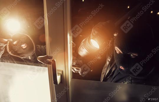 Two Burglar breaking in a window of a house at night  : Stock Photo or Stock Video Download rcfotostock photos, images and assets rcfotostock | RC-Photo-Stock.: