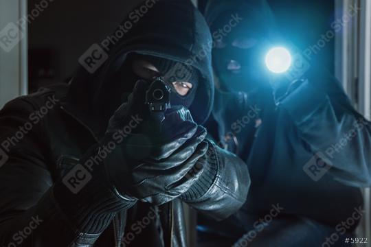 Two Burglar trying to break into a house with a Gun  : Stock Photo or Stock Video Download rcfotostock photos, images and assets rcfotostock | RC-Photo-Stock.: