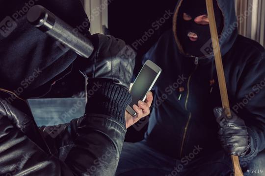 Two burglar use smartphone for a Housebreak  : Stock Photo or Stock Video Download rcfotostock photos, images and assets rcfotostock | RC Photo Stock.: