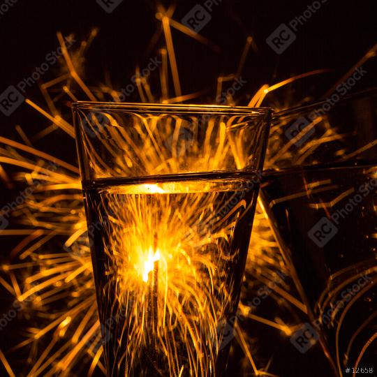Two glasses of champagne with fireworks sparklers  : Stock Photo or Stock Video Download rcfotostock photos, images and assets rcfotostock | RC Photo Stock.: