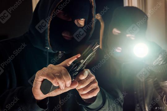 Two masked Burglar with gun and flashlight breaking in a house  : Stock Photo or Stock Video Download rcfotostock photos, images and assets rcfotostock | RC Photo Stock.: