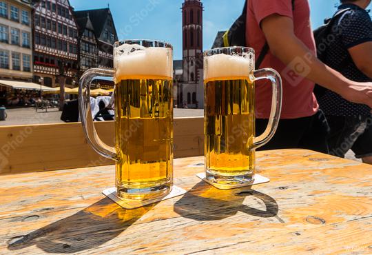 Two mugs of beer on table at Frankfurt in germany  : Stock Photo or Stock Video Download rcfotostock photos, images and assets rcfotostock | RC Photo Stock.: