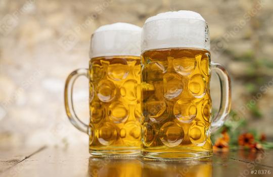 Two mugs of beer with foam stand on the table   : Stock Photo or Stock Video Download rcfotostock photos, images and assets rcfotostock | RC Photo Stock.: