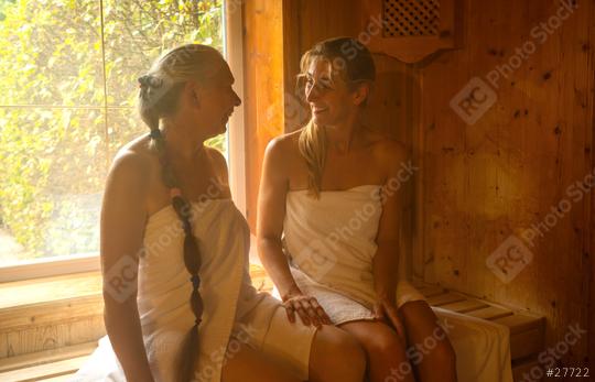 Two women in a finish sauna, smiling at each other, sunlight through window, wooden walls. Spa wellness hotel concept image  : Stock Photo or Stock Video Download rcfotostock photos, images and assets rcfotostock | RC Photo Stock.: