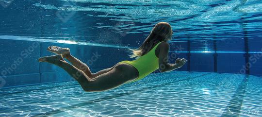 Underwater shot of woman inside swimming pool  : Stock Photo or Stock Video Download rcfotostock photos, images and assets rcfotostock | RC Photo Stock.: