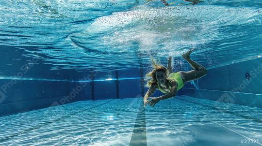 Underwater woman portrait in swimming pool  : Stock Photo or Stock Video Download rcfotostock photos, images and assets rcfotostock | RC Photo Stock.: