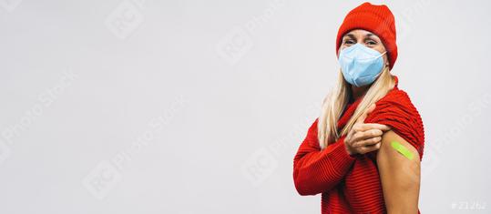 vaccine injection for corona virus COVID-19. Woman with face mask holding up her sweater sleeve and showing her arm with green Adhesive bandage Plaster after receiving vaccination, copy space banner  : Stock Photo or Stock Video Download rcfotostock photos, images and assets rcfotostock | RC Photo Stock.: