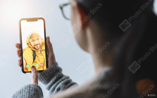 Videoconference with Boy Friend, Woman using video chat conference. Stay at home. Home quarantine or prevention of coronavirus infection (virus covid-19). Woman using smartphone.  : Stock Photo or Stock Video Download rcfotostock photos, images and assets rcfotostock | RC Photo Stock.: