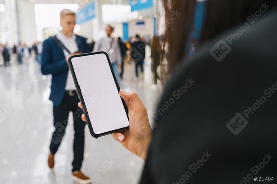 view of a smartphone in female hands with empty screen, with crowd of people, copyspace for your individual text.  : Stock Photo or Stock Video Download rcfotostock photos, images and assets rcfotostock | RC Photo Stock.: