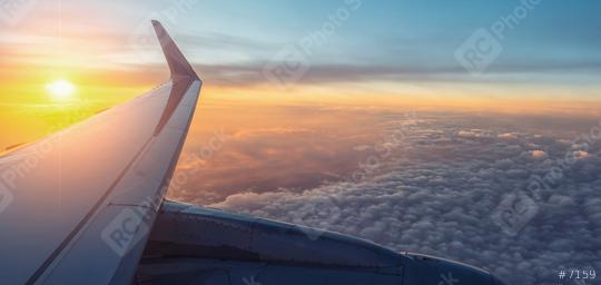 View on the sunset and airplane wing from the inside  : Stock Photo or Stock Video Download rcfotostock photos, images and assets rcfotostock | RC Photo Stock.: