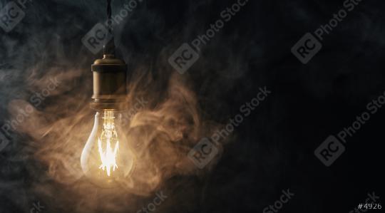 Vintage Edison lightbulb with smoke   : Stock Photo or Stock Video Download rcfotostock photos, images and assets rcfotostock | RC Photo Stock.: