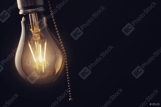 Vintage hanging light bulb with switch over dark background  : Stock Photo or Stock Video Download rcfotostock photos, images and assets rcfotostock | RC Photo Stock.: