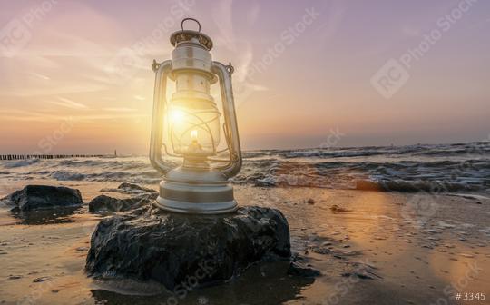 vintage lantern on stone at sunset, romantic evening at the beach  : Stock Photo or Stock Video Download rcfotostock photos, images and assets rcfotostock | RC Photo Stock.: