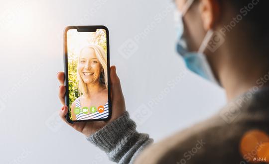 Virtual talking with friends, colleague and using video chat conference. Remote learning or work. Home quarantine or prevention of coronavirus infection (virus covid-19). Woman using smartphone.   : Stock Photo or Stock Video Download rcfotostock photos, images and assets rcfotostock | RC Photo Stock.: