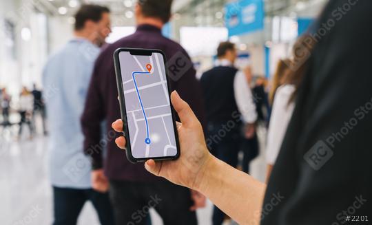 Visitor using GPS map navigation app on smartphone screen to get direction to destination address in the city, travel and technology concept image  : Stock Photo or Stock Video Download rcfotostock photos, images and assets rcfotostock | RC Photo Stock.:
