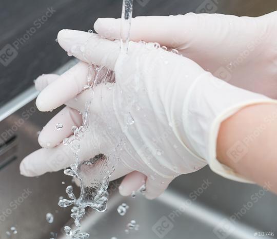 Washing hands with One-time gloves  : Stock Photo or Stock Video Download rcfotostock photos, images and assets rcfotostock | RC Photo Stock.: