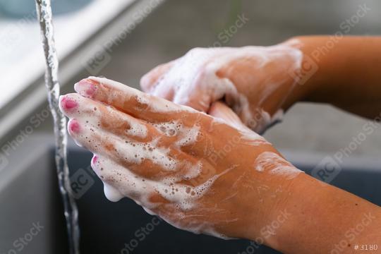 Washing of hands with soap under running water.  : Stock Photo or Stock Video Download rcfotostock photos, images and assets rcfotostock | RC Photo Stock.: