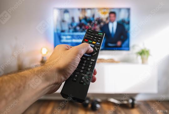 Watching TV and using remote controller to zap channels, pov shot  : Stock Photo or Stock Video Download rcfotostock photos, images and assets rcfotostock | RC Photo Stock.:
