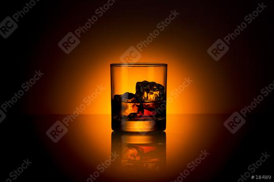 Whiskey glass bourbon with ice cubes rocks and orange sunset dawn summer  : Stock Photo or Stock Video Download rcfotostock photos, images and assets rcfotostock | RC Photo Stock.: