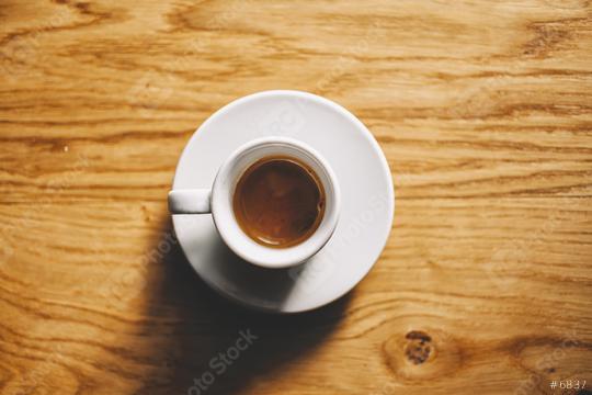 White Coffee Cup filled with Espresso on wooden table with coffee beans. table Top view  : Stock Photo or Stock Video Download rcfotostock photos, images and assets rcfotostock | RC Photo Stock.: