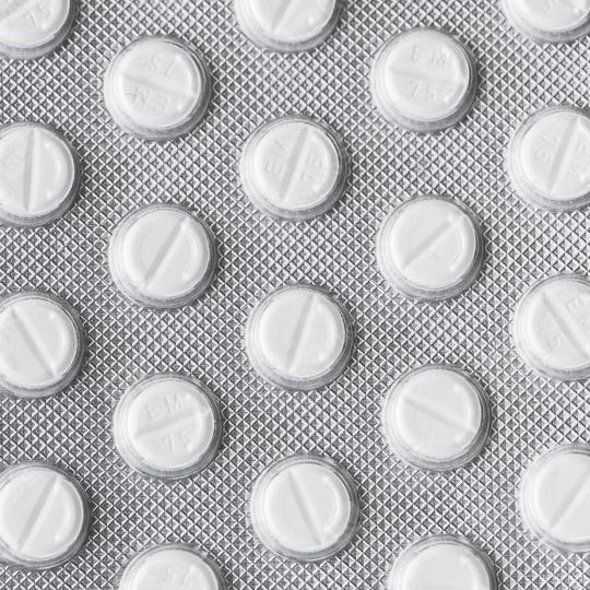 White pills in Blister packaging antibiotic pharmacy medicine medical flu  : Stock Photo or Stock Video Download rcfotostock photos, images and assets rcfotostock | RC Photo Stock.: