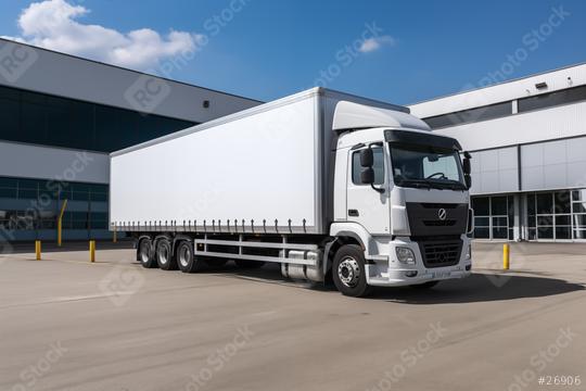 White semi truck parked by a warehouse
  : Stock Photo or Stock Video Download rcfotostock photos, images and assets rcfotostock | RC Photo Stock.: