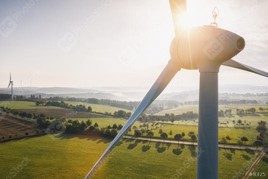 Wind turbine and agricultural fields on a summer day - Energy Production with clean and Renewable Energy - aerial shot  : Stock Photo or Stock Video Download rcfotostock photos, images and assets rcfotostock | RC Photo Stock.: