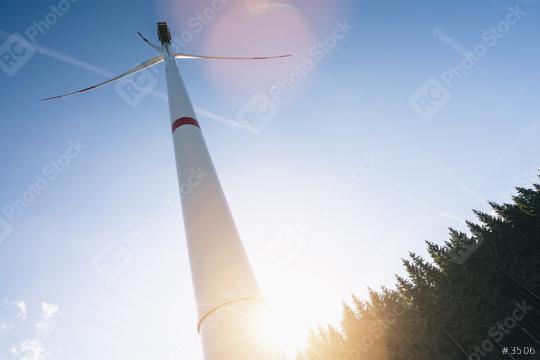 Wind turbine in the forest against sunlight  : Stock Photo or Stock Video Download rcfotostock photos, images and assets rcfotostock | RC Photo Stock.: