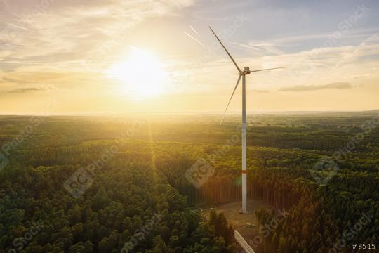 Wind Turbine in the forest at sunset aerial view drone shot - Energy Production with clean and Renewable Energy  : Stock Photo or Stock Video Download rcfotostock photos, images and assets rcfotostock | RC Photo Stock.: