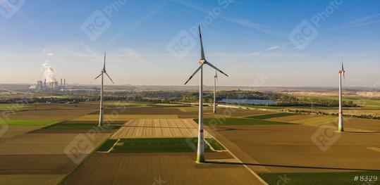 Wind turbine with coal power plant view from drone - environment friendly, renewable energy concept - copyspace for your individual text  : Stock Photo or Stock Video Download rcfotostock photos, images and assets rcfotostock | RC Photo Stock.: