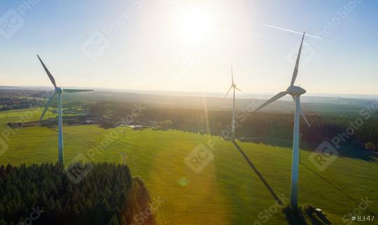 Wind turbines and agricultural fields on a summer day - Energy Production with clean and Renewable Energy - aerial drone shot  : Stock Photo or Stock Video Download rcfotostock photos, images and assets rcfotostock | RC Photo Stock.: