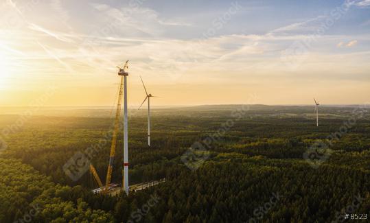 Wind turbines under construction in the forest - Energy Production with clean and Renewable Energy - aerial shot  : Stock Photo or Stock Video Download rcfotostock photos, images and assets rcfotostock | RC Photo Stock.:
