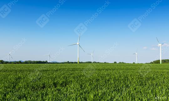 wind wheels in a field wind-turbine wind farm against blue sky agriculture  : Stock Photo or Stock Video Download rcfotostock photos, images and assets rcfotostock | RC Photo Stock.: