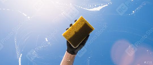 window cleaner with sponge and gloves cleaning glass window, banner size, Cleaning concept image  : Stock Photo or Stock Video Download rcfotostock photos, images and assets rcfotostock | RC Photo Stock.: