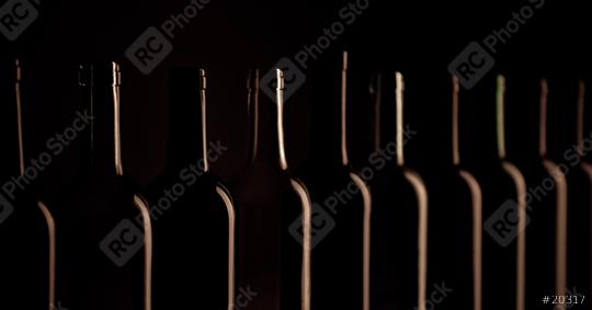 Wine bottles in a row on black  background, close up  : Stock Photo or Stock Video Download rcfotostock photos, images and assets rcfotostock | RC Photo Stock.: