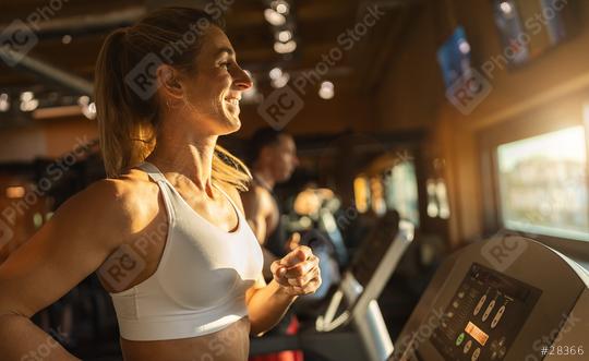 woman and man in the gym running on treadmill  : Stock Photo or Stock Video Download rcfotostock photos, images and assets rcfotostock | RC Photo Stock.: