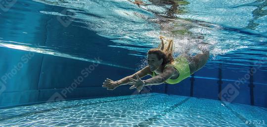 Woman dives underwater in the swimming pool  : Stock Photo or Stock Video Download rcfotostock photos, images and assets rcfotostock | RC Photo Stock.: