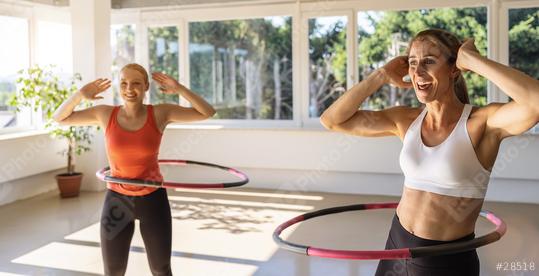 Woman doing hula hoop during an exercise class in a gym. Healthy sports lifestyle, Fitness, Healthy concept.  : Stock Photo or Stock Video Download rcfotostock photos, images and assets rcfotostock | RC Photo Stock.: