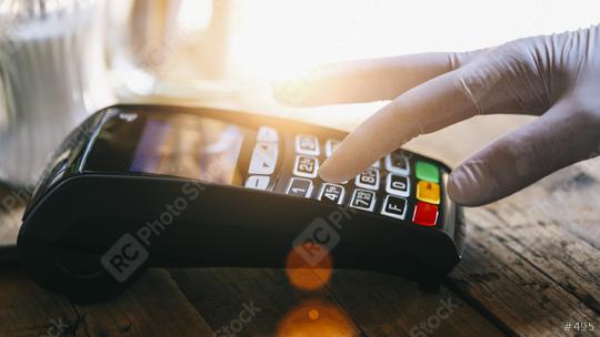 Woman hand with medical latex protective gloves enters PIN code on payment terminal in a bar. Protection for Coronavirus COVID-19.   : Stock Photo or Stock Video Download rcfotostock photos, images and assets rcfotostock | RC Photo Stock.: